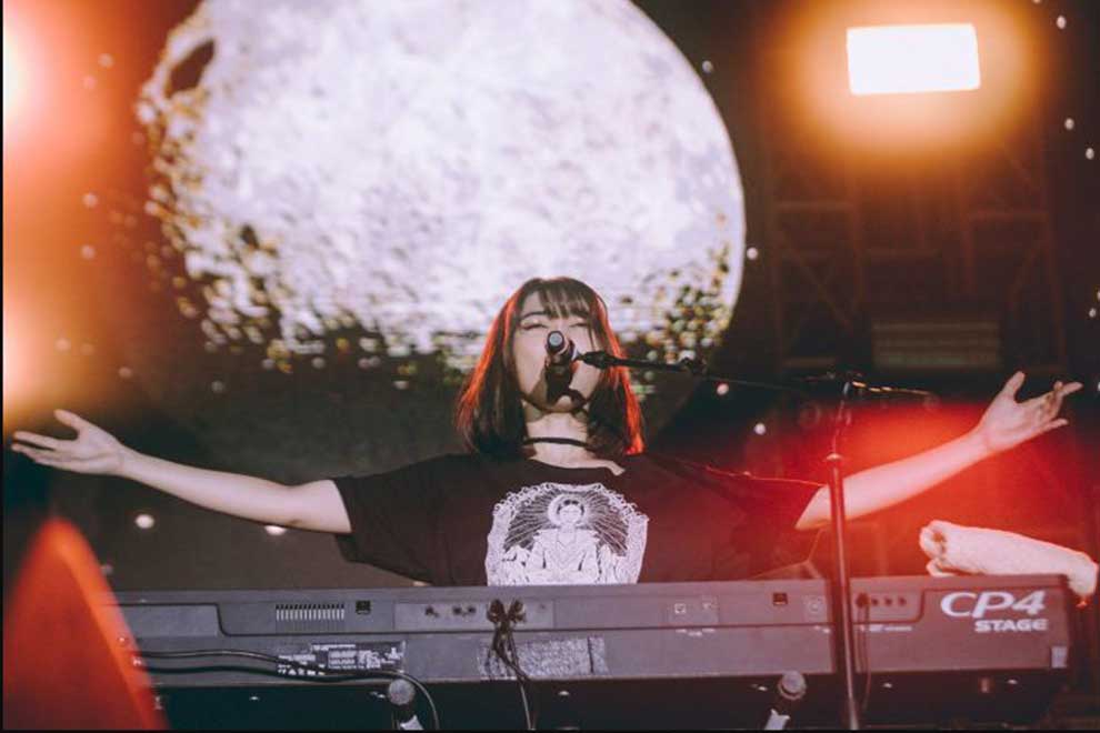 Operatic Singer-songwriter Isyana Sarasvati belts out her latest tunes while playing the keyboard at Joyland Bali 2022 on March 27. JOYLAND BALI