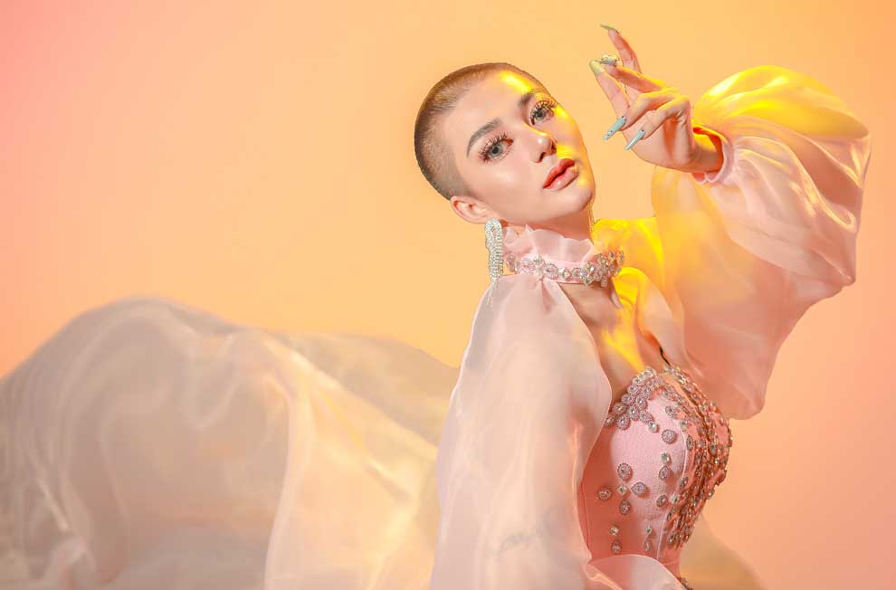 Some Cambodians find the juxtaposition of her elegant and delicate facial structure and her shaved head jarring, but her mother says it enhances her looks. SUPPLIED