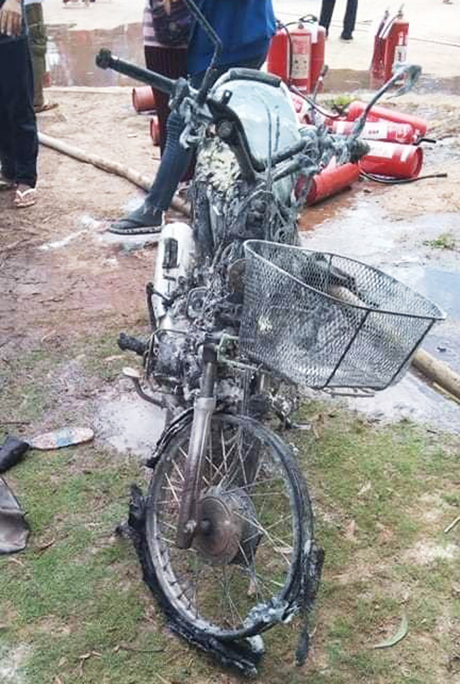 One of the motorcycles destroyed by a fire at a factory in Svay Rieng province’s Bavet town on May 24. FACEBOOK