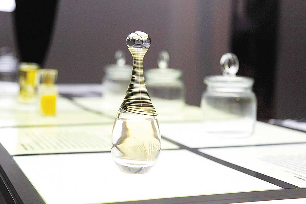Three of the fashion house perfumes featured in the exhibition.