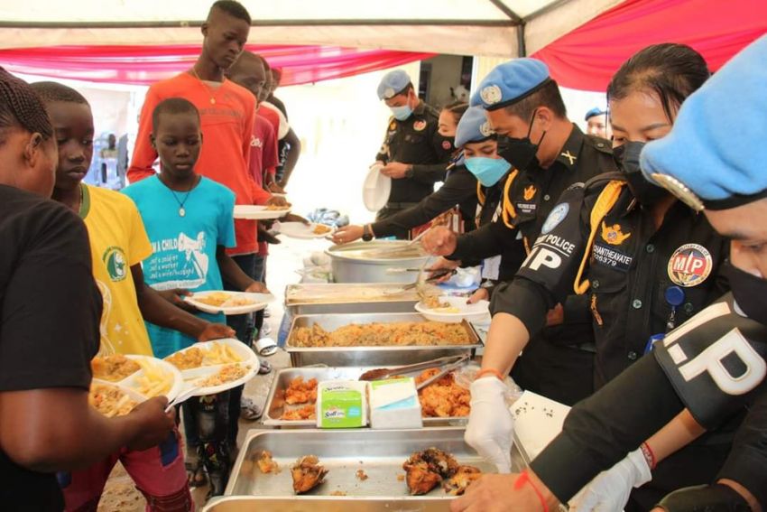 Cambodian peacekeepers serve meals to children at St Claire Orphanage Centre in South Sudan on April 30. PEACEKEEPERS FOR THE WORLD VIA FB