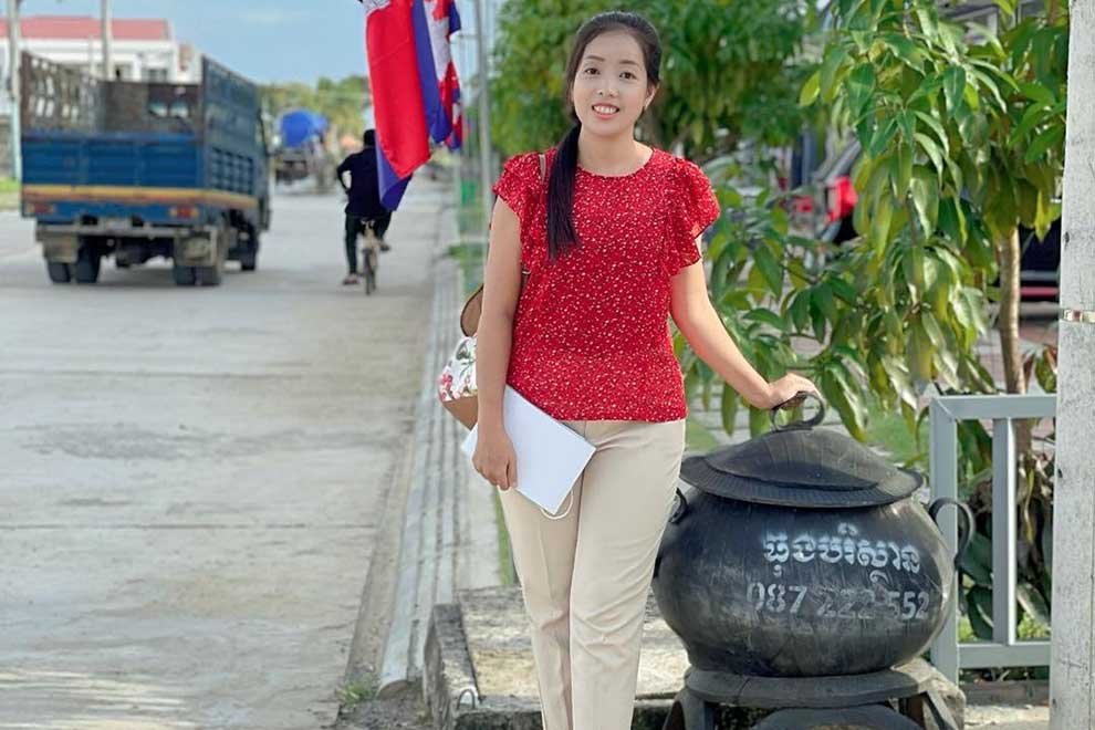 Eco-Bin founder Soeurng Sothavy poses with one of her bins in Kampong Cham. SUPPLIED