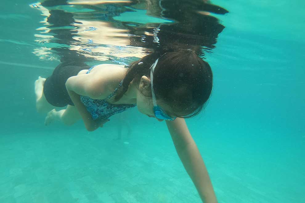 Chay Thida, who suffers from paralysis in one arm and one leg, swims laps. PHOTO SUPPLIED