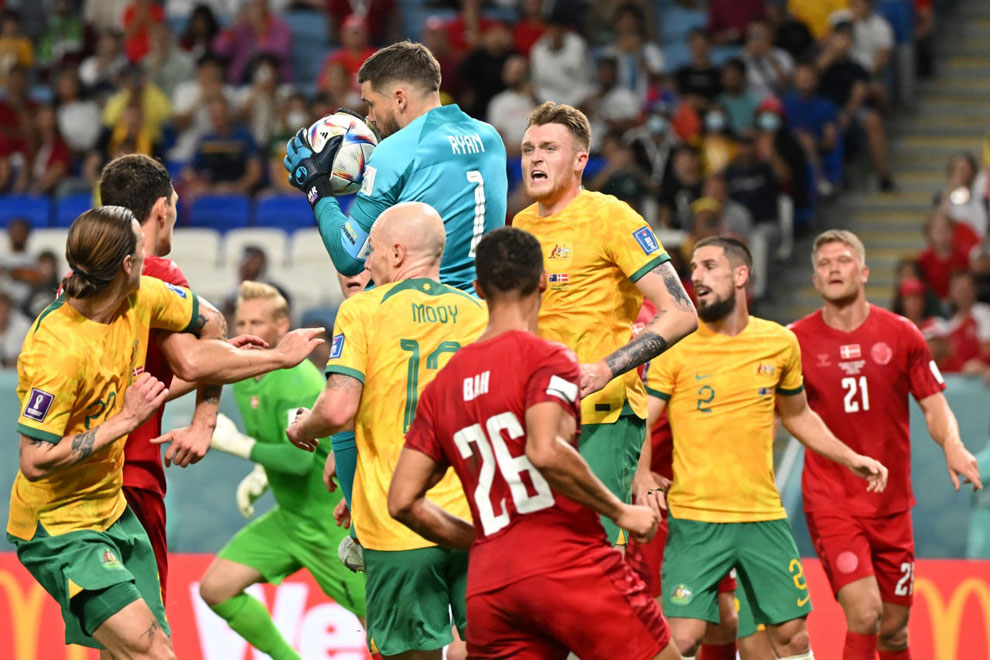 Australia's goalkeeper #01 Mathew Ryan (centre) makes a save during their Qatar 2022 World Cup Group D football match against Denmark at the Al-Janoub Stadium in Al-Wakrah, south of Doha, on November 30. AFP