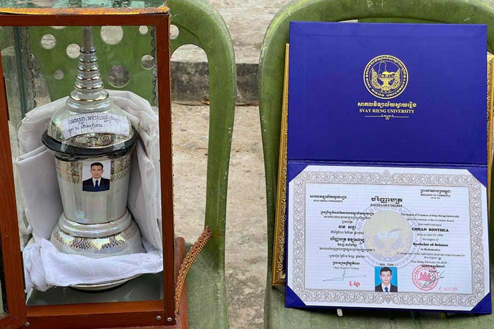 The ashes of Chhan Sonthea in an urn opposite his diploma. PHOTO SUPPLIED