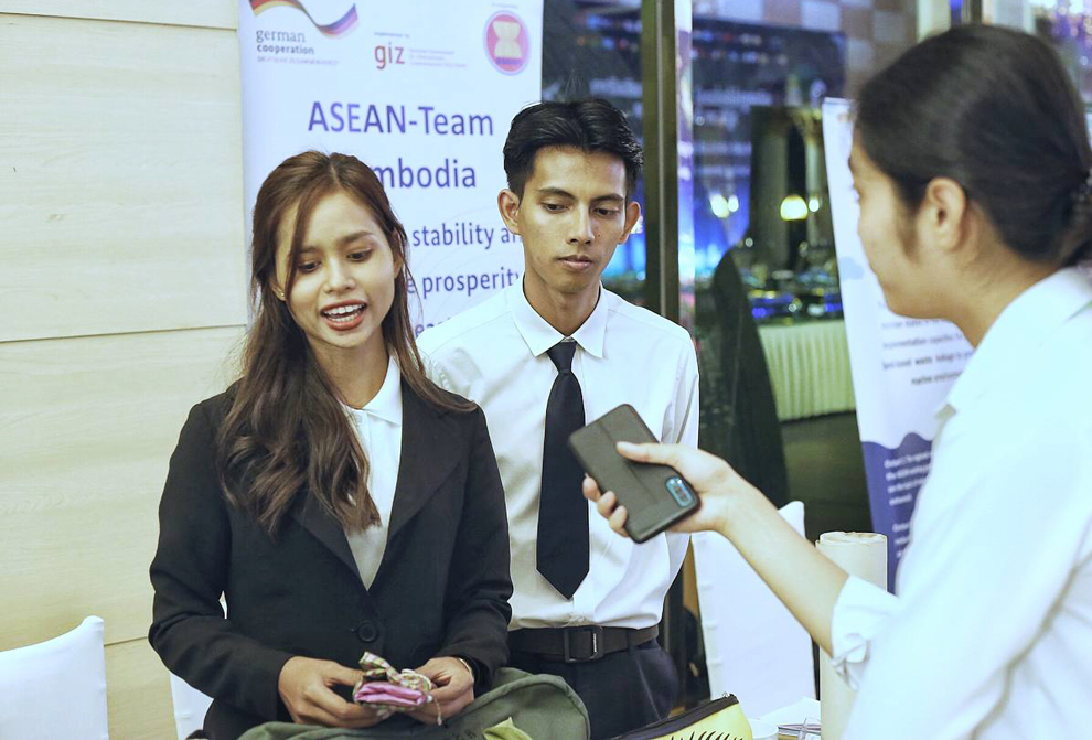 Soeung Sreynich (left), a former bio-engineer who makes eco-plates and other products from banana trees. PHOTO SUPPLIED