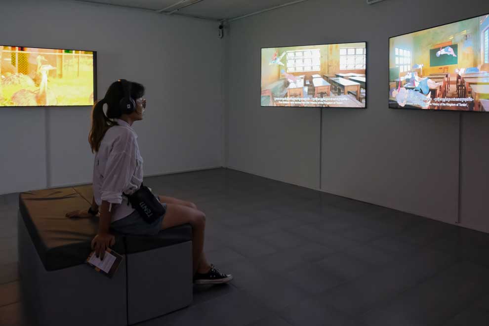 Visitors view Myth in Motion during the opening day of the exhibition on June 7. PHOTO SUPPLIED