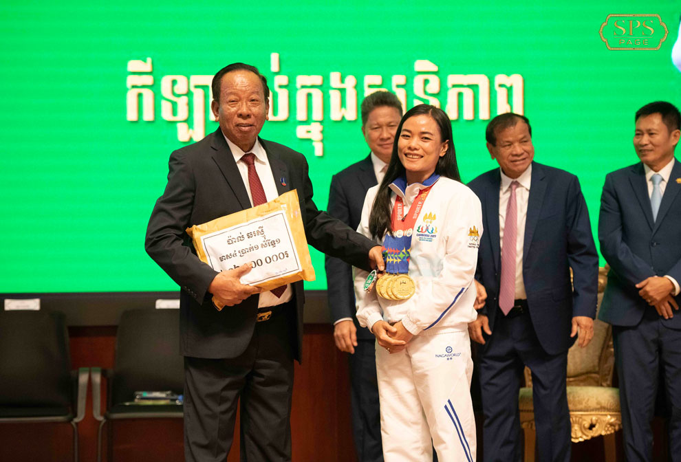 Outstanding Cambodian Vovinam athlete Pal Chhor Rasmey, who earned four gold medals in SEA Games received award from Defence Minister Tea Banh. SPS