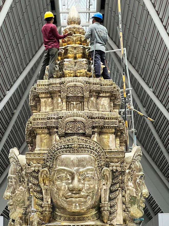 Workers install the four-faced Brahman statue at Siem Reap-Angkor International Airport on July 20. SOPHEAP KHMER ART