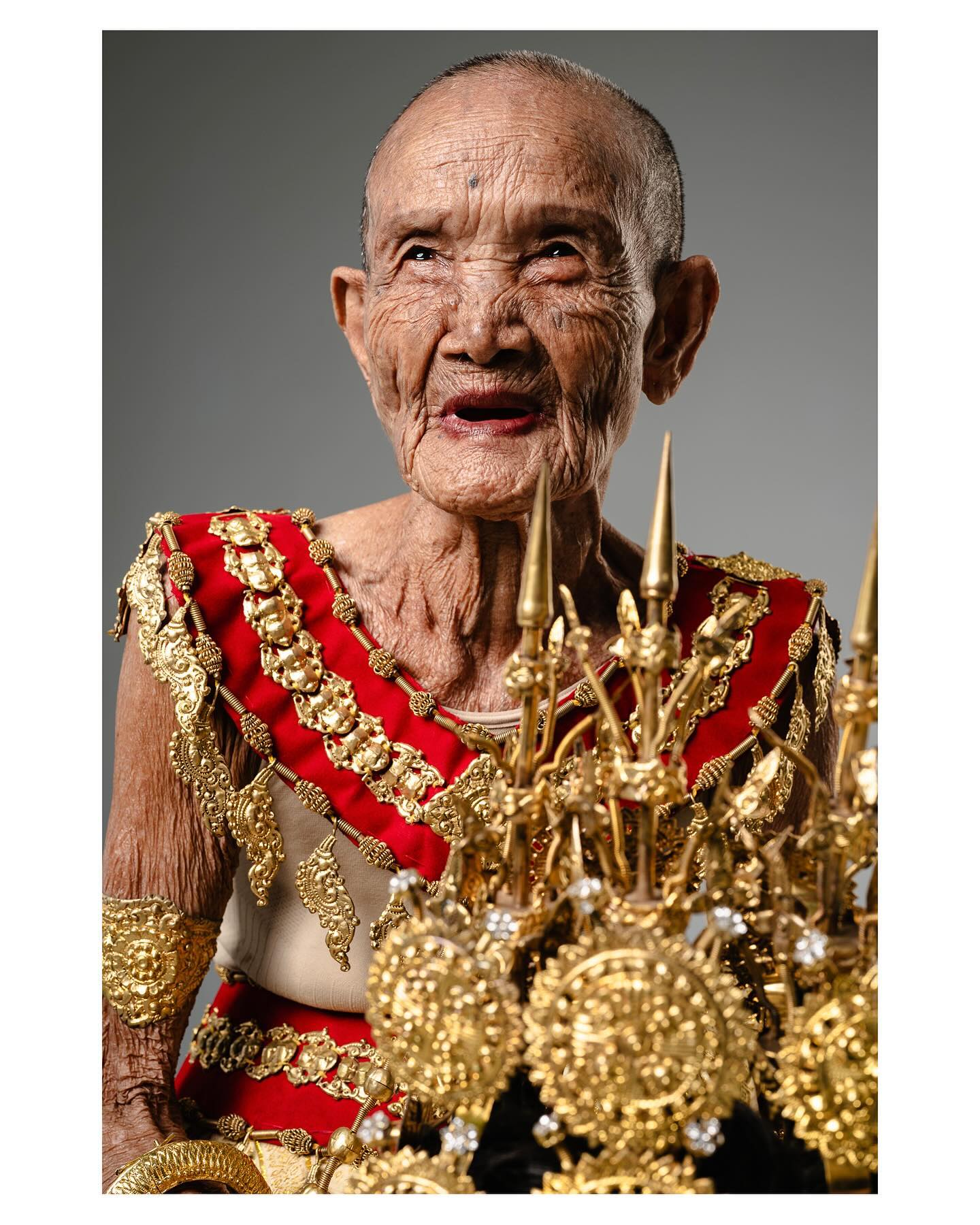 "Granny Mao", at 104 years old, was photographed in the traditional attire of a Cambodian Apsara. The photographer says he was honoured to get the chance to capture her resilient spirit and share the poignant images with the world. Cambodia_streetwise