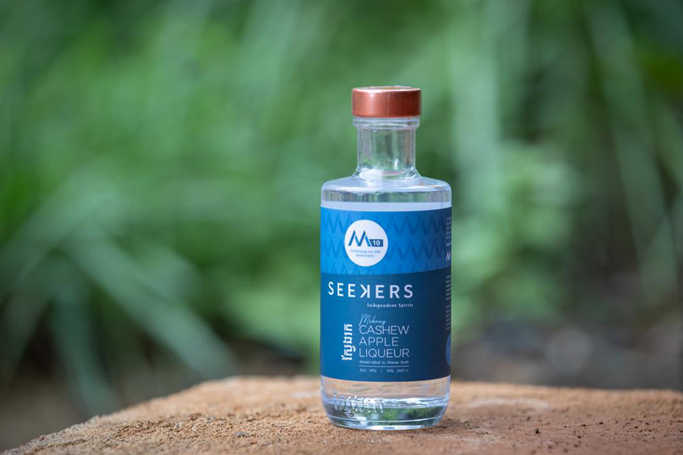 The liqueur is made from cashew apples, collected as part of the deforestation-free cashew programme at Lumphat Wildlife Sanctuary. USAID Morodok Baitang