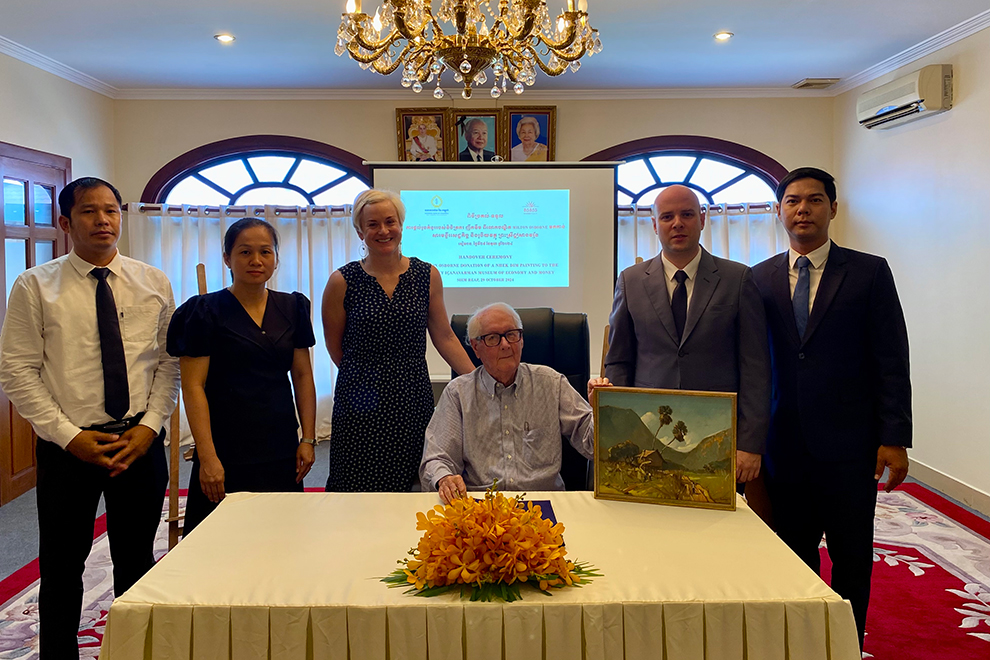 Dr. Milton Osborne, a distinguished Australian academic and former diplomat, donates a Nhek Dim painting to the SOSORO Museum. Dim, one of Cambodia’s most influential painters, is renowned for his ability to encapsulate the beauty of rural life in his works. Supplied