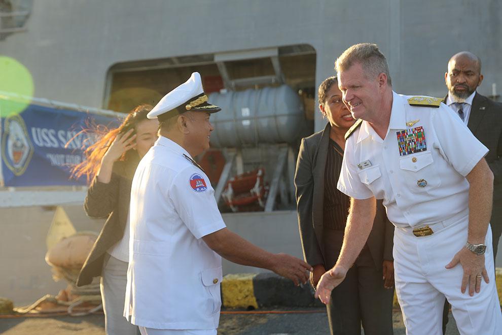 Rear Admiral Mey Dina, Commander of Ream Naval Base (left), shakes hand with Admiral Samuel Paparo, Commander of the United States Indo-Pacific Command at Sihanoukville Autonomous Port on December 18. Hong Raksmey