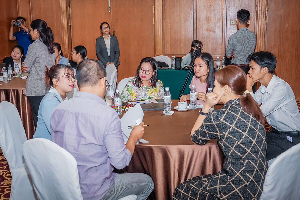 Participants discuss gender-sensitive safety guidelines at the Phnom Penh forum. DMC