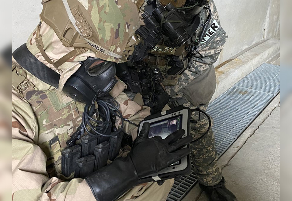 Members of the Counter-WMD Task Force operate the PackBot through a control panel, monitoring a building’s interior via the live feed on its screen. PHOTO: THE KOREA HERALD