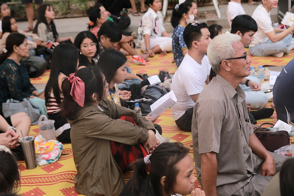 The audience await the beginning of the performance at MC Park. Hong Raksmey