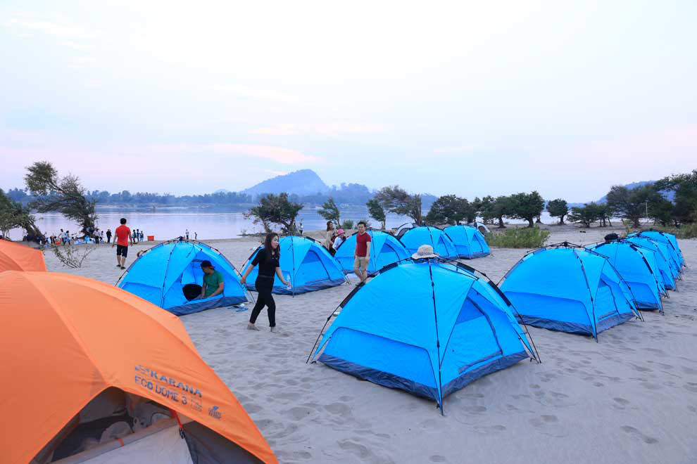 Tourists enjoy camping on the Mekong islands in Stung Treng. Post Staff
