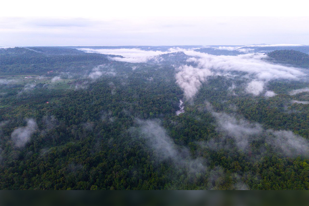 A lush natural landscape surrounded by white clouds in the Cardamom Mountains in Thma Bang district, it is part of the Cambodia Sustainable Landscape and Ecotourism Project (CSLEP) project. Supplied
