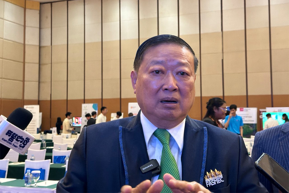 Te Taing Por, president of FASMEC, gives an interview to the media. Hin Pisei