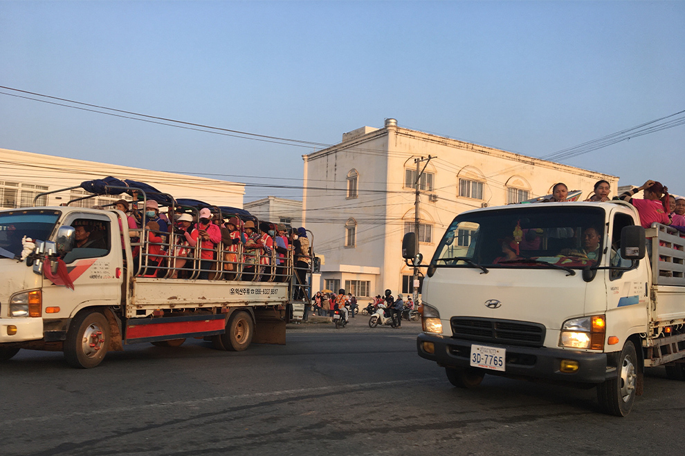 Factory workers commute to work in Kampong Chhnang province earlier in April. Niem Chheng