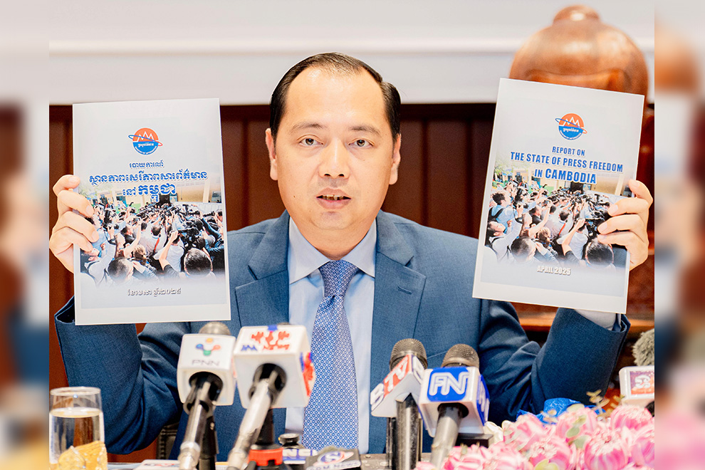 Information minister Neth Pheaktra shows the report – available in Khmer and English – ahead of the annual media lunch with the prime minister, set to be held on May 3. Supplied