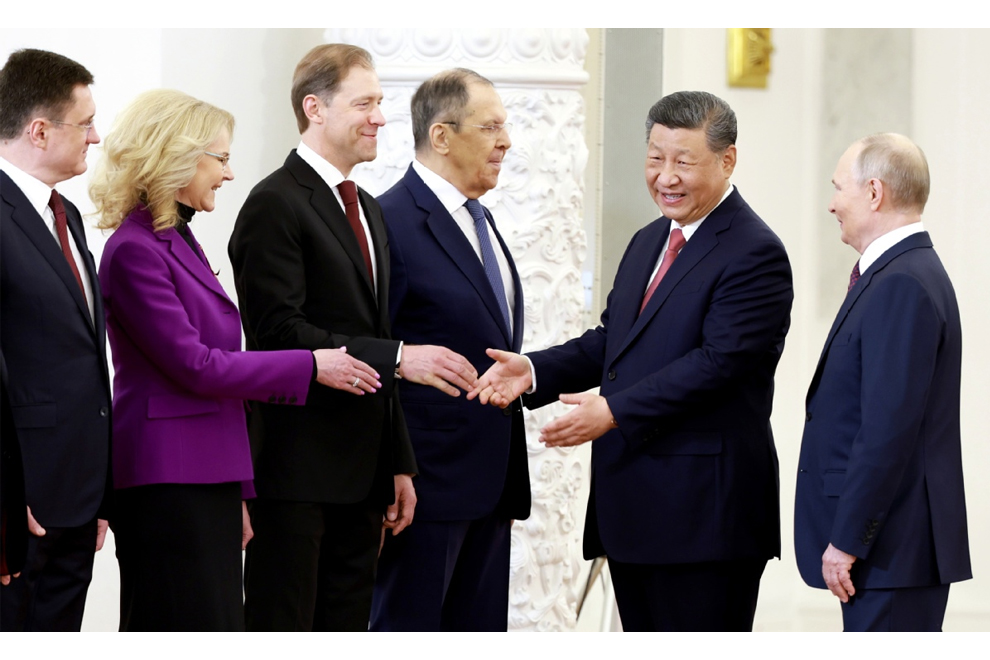 President Xi attends a welcoming ceremony held on Thursday in the Kremlin in Moscow by Russian President Putin. PHOTO: CHINA DAILY