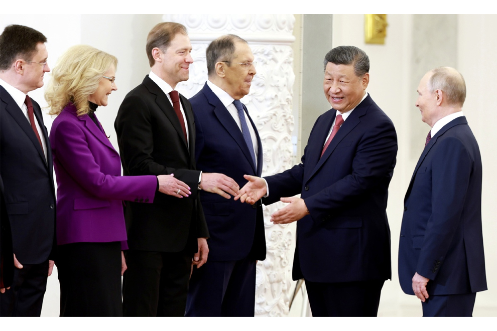 President Xi attends a welcoming ceremony held on Thursday in the Kremlin in Moscow by Russian President Putin. PHOTO: CHINA DAILY