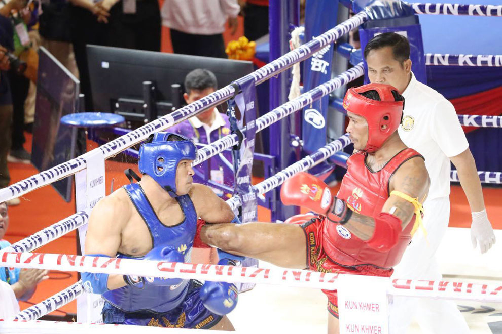 Prom Samnang (in red) on his way to claiming gold at the 32nd SEA Games in 2023 in Cambodia. Supplied