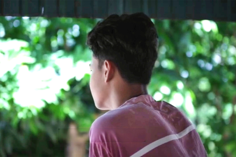 The picture shows an example of safeguarding guidelines: the boy’s identity was concealed when his story of domestic violence was shared. Supplied