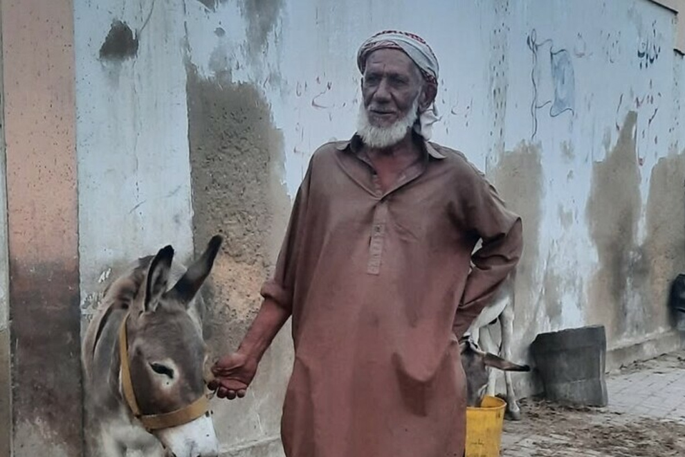 Saleem Maibaap, a 60-year-old donkey cart owner who has been working in the transportation business for decades. PHOTO: DAWN