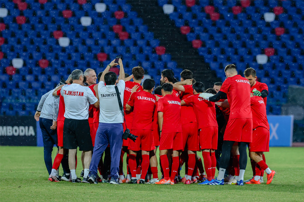 Tajikistan's national team trains at the National Olympic Stadium on Wednesday, ahead of their match against hosts Cambodia on Thursday night. FFC