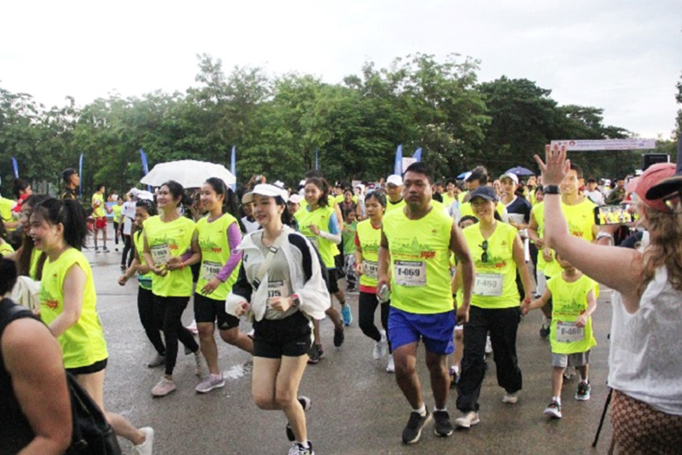Sem Phalla (left) and Vath Chamroeun address a June 23 press conference at the NOCC headquarters. NOC