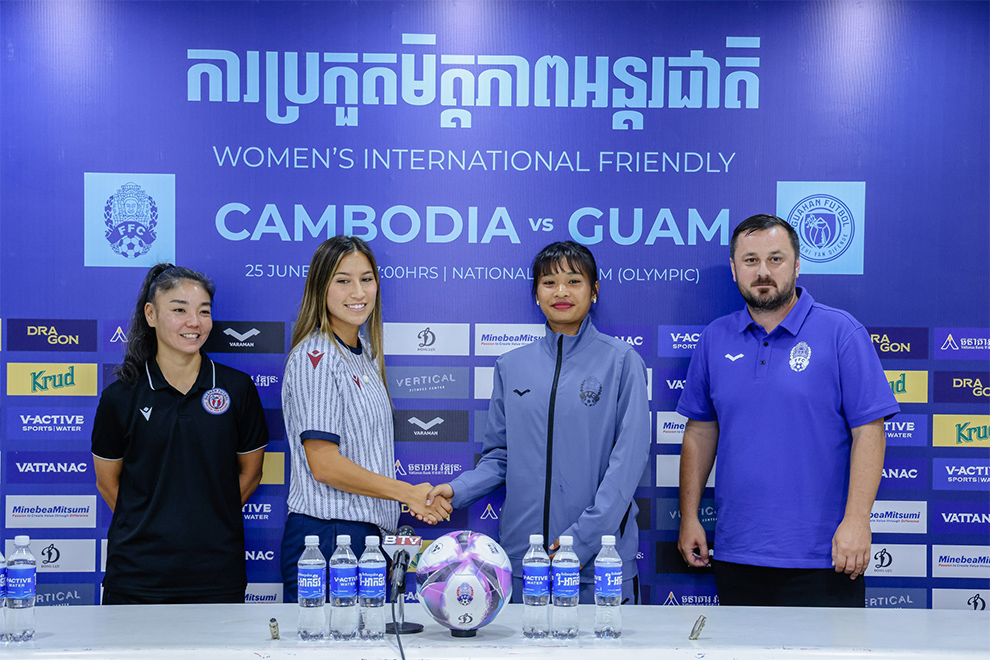 The coaches and captains of the Cambodia and Guam national sides attend a press conference on Tuesday. CPL