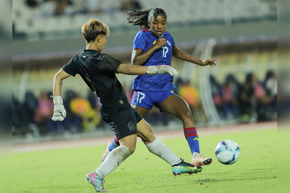 Action from last night’s Cambodia-Philippines match at the National Olympic Stadium. FFC