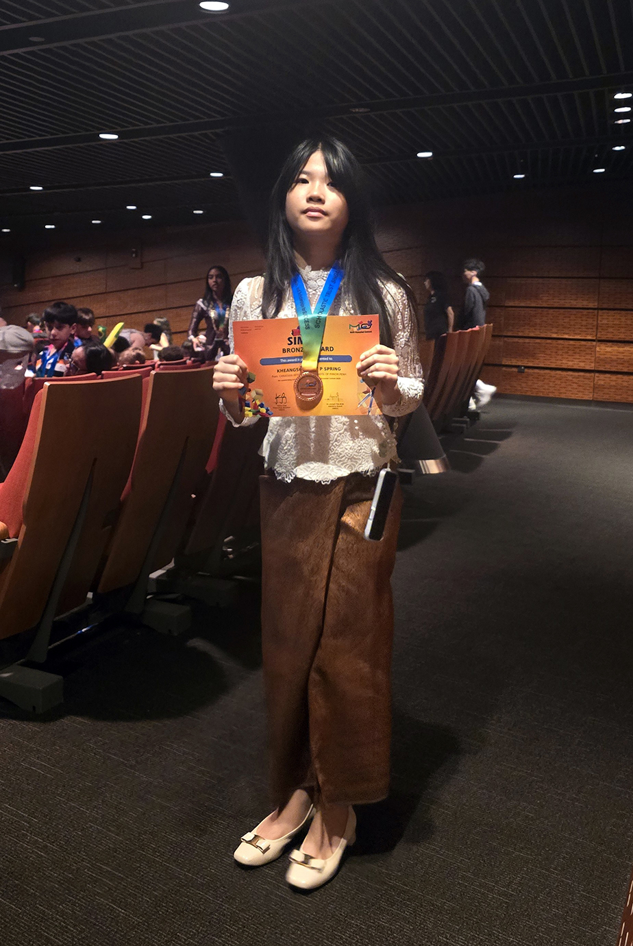 Kheangsophany P. Spring won second place as Global Champion, three trophies and two gold medals at TeenEagle UK. Supplied