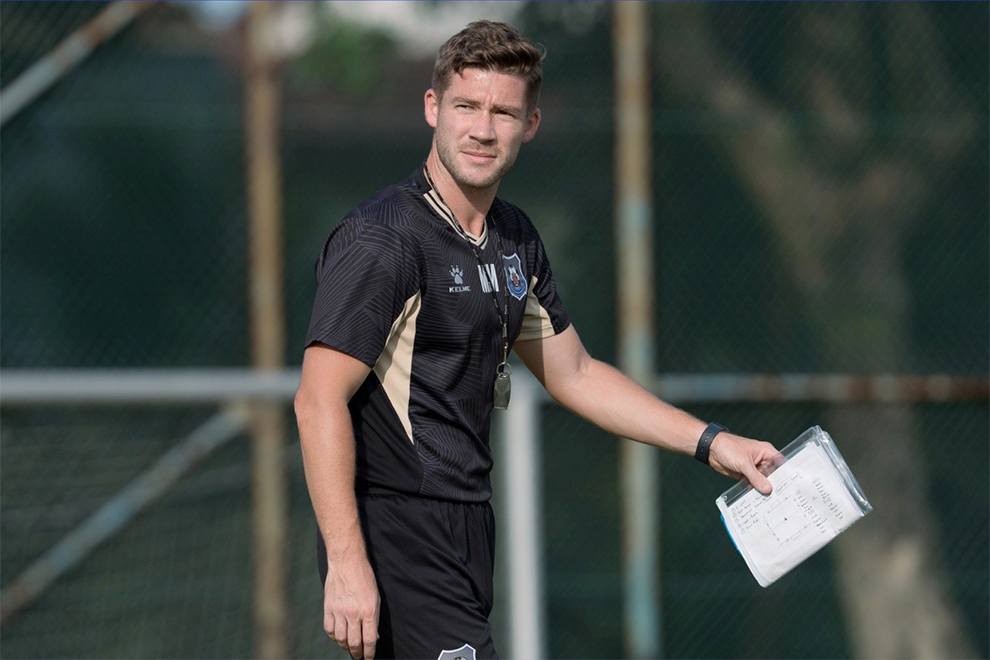 Nonplussed new head coach Mattew McConkey leads Svay Rieng through a Malaysia team training. Svay Rieng FC