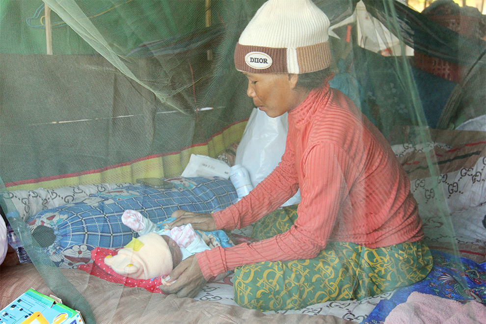 Chenda, the mother of Samnang, gave birth shortly after arriving at the refugee site in Siem Reap. Hong Raksmey