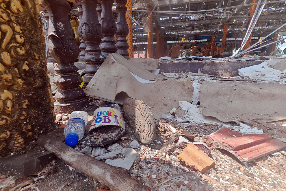 A pair of shoes was seen left behind at the Tamoan Meanchey Pagoda, which was damaged by Thai shelling. Hong Raksmey