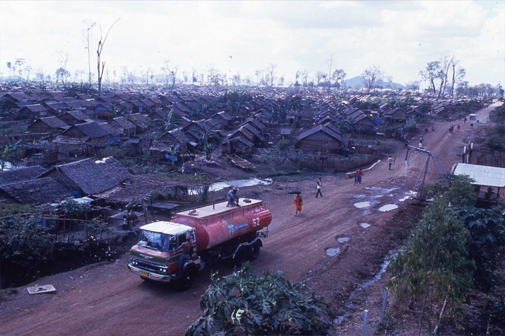 The children of refugee families queue for water in one of the camps on the Thai border. DC-Cam