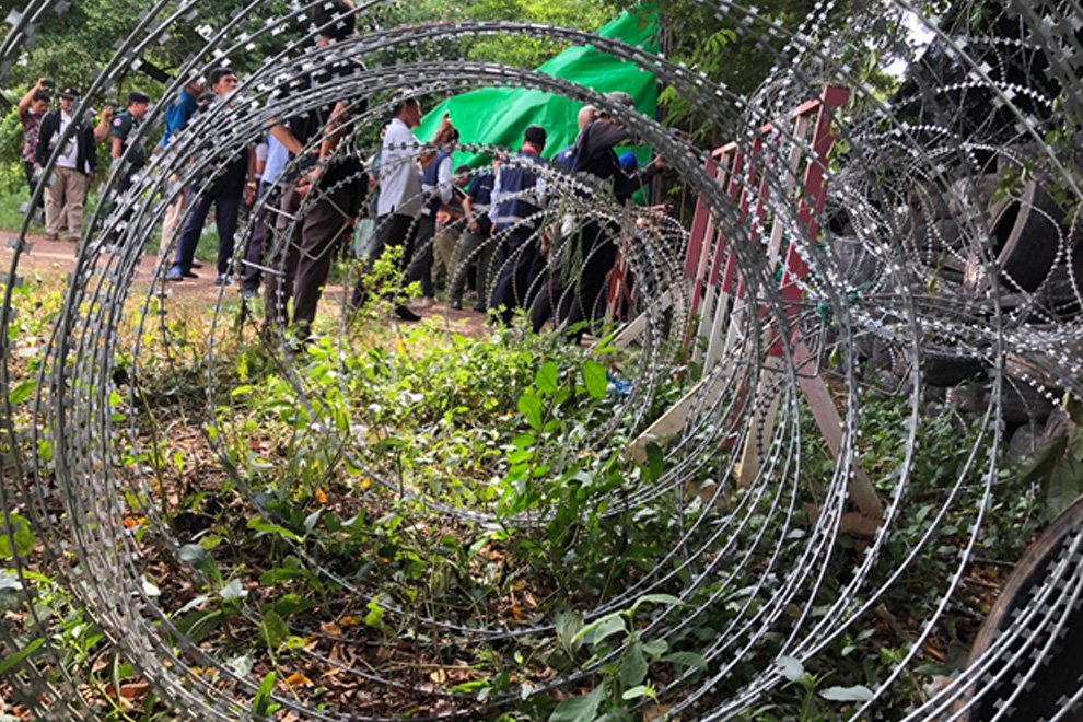 Dense Thai barbed wire in Chok Chey village. Niem Chheng