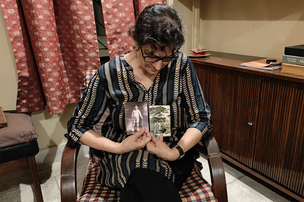 Historian Tapati Guha-Thakurta holding old photos of her parents, who moved from present-day Bangladesh to India before the Partition. ST PHOTO: DEBARSHI DASGUPTA