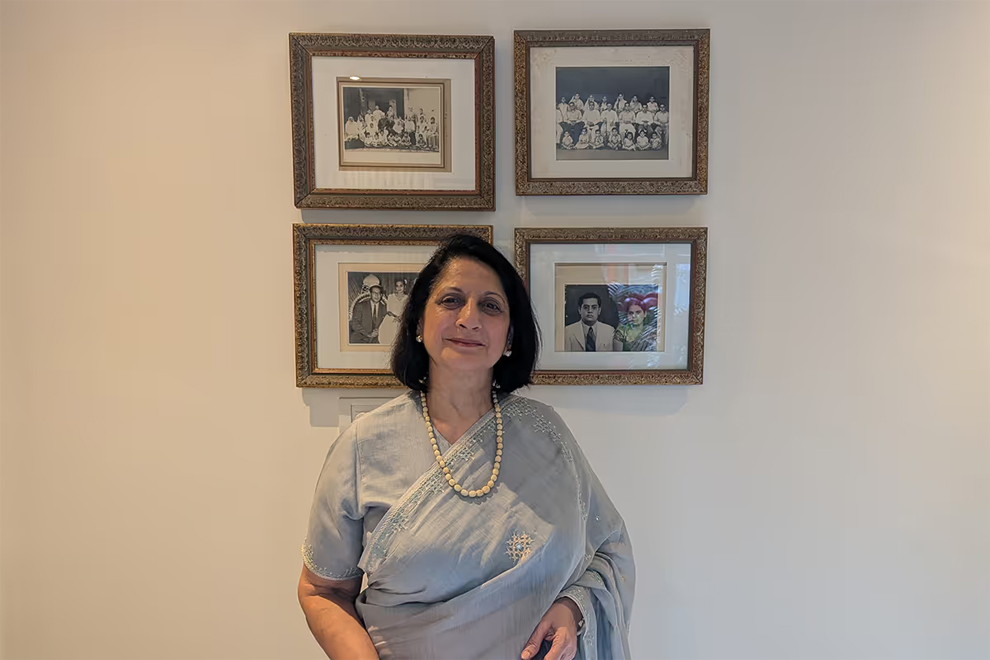 Mrs Aruna Madnani, who lives in Bengaluru, standing in front of old photos of her Sindhi family, which moved from what is now Pakistan to present-day India. ST PHOTO: ROHINI MOHAN
