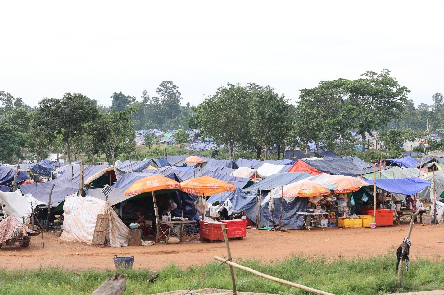 Thousands of people remain at the Wat Por 5,000 pagoda camp, living in improvised shelters and subsisting from donations. Supplied