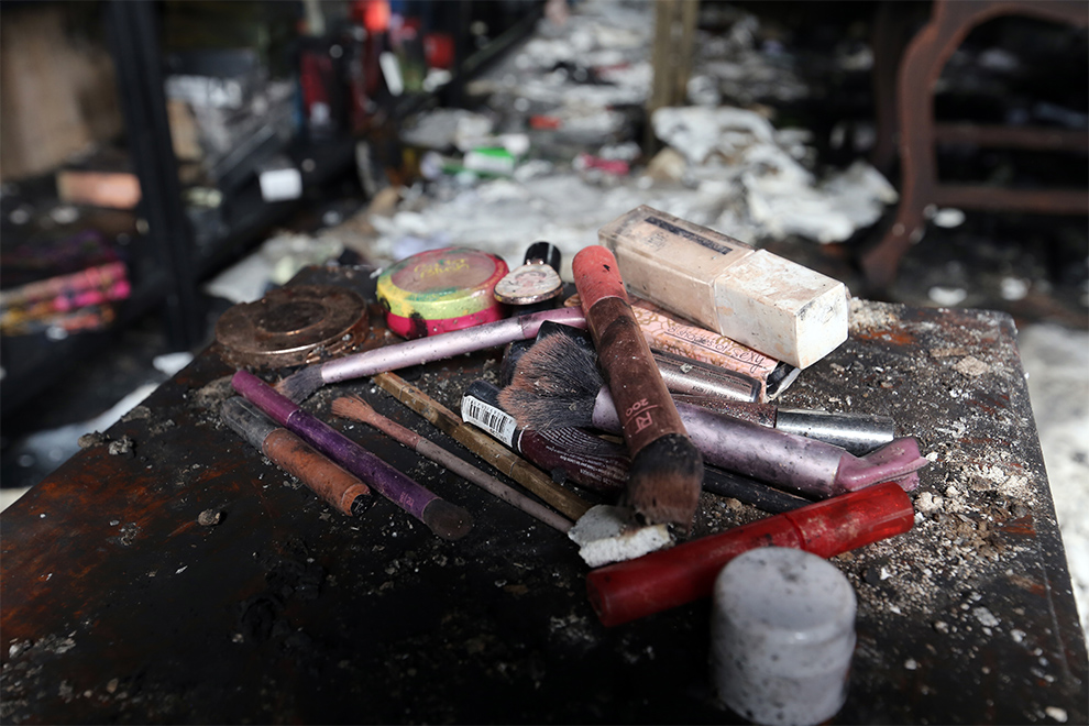 Abandoned cosmetics in the ruins of a bombed-out home. Hong Raksmey