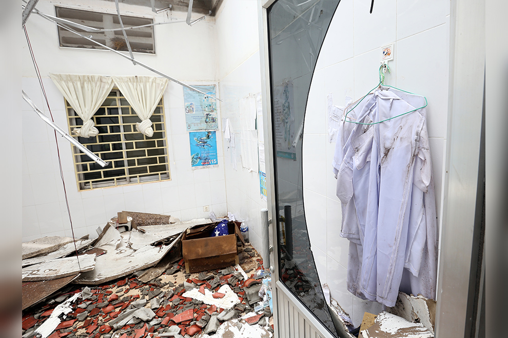 A staff members uniform hangs in the destroyed Tamone referral health centre. Hong Raksmey
