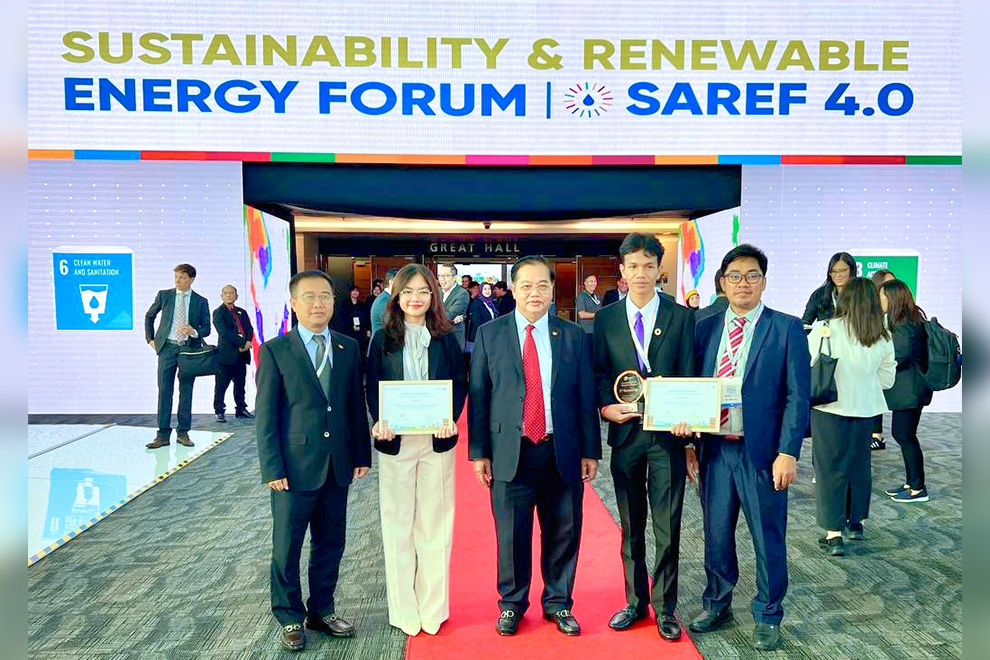 The Cambodian winners take a photograph with the Cambodian delegations at the event. Supplied