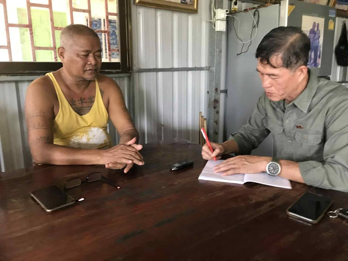 Nguon Chan Mol (left) shares his story with DC-Cam’s Long Dany. DC-Cam