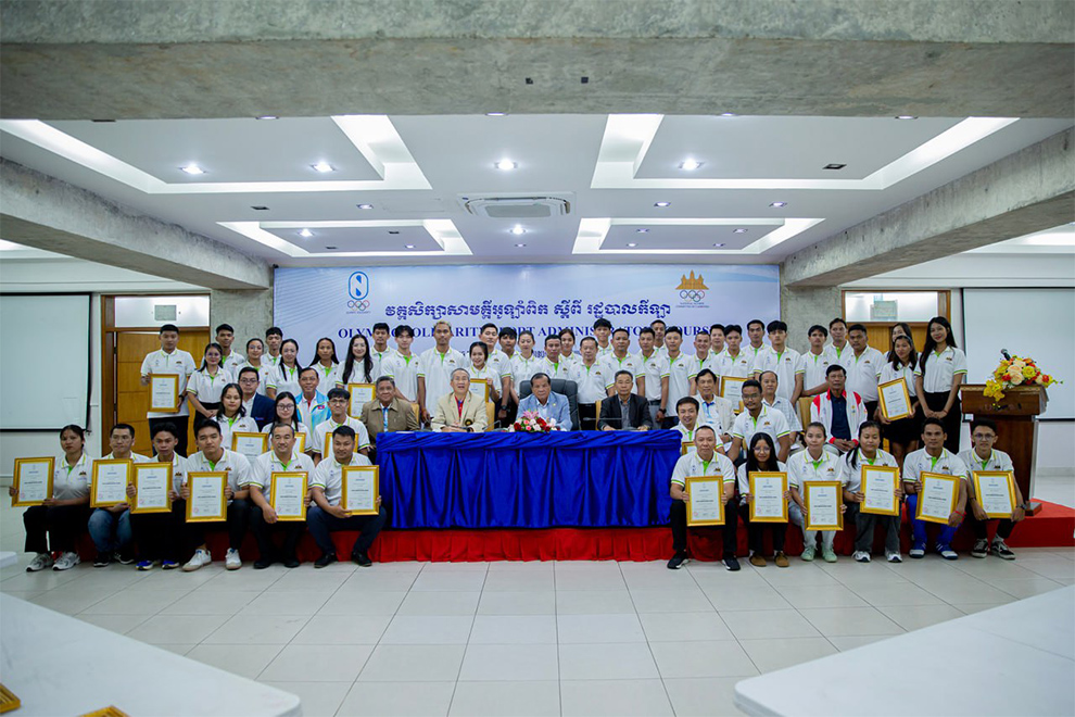 The graduates of the Olympic Solidarity Sports Administration course pose for a photograph together. NOCC