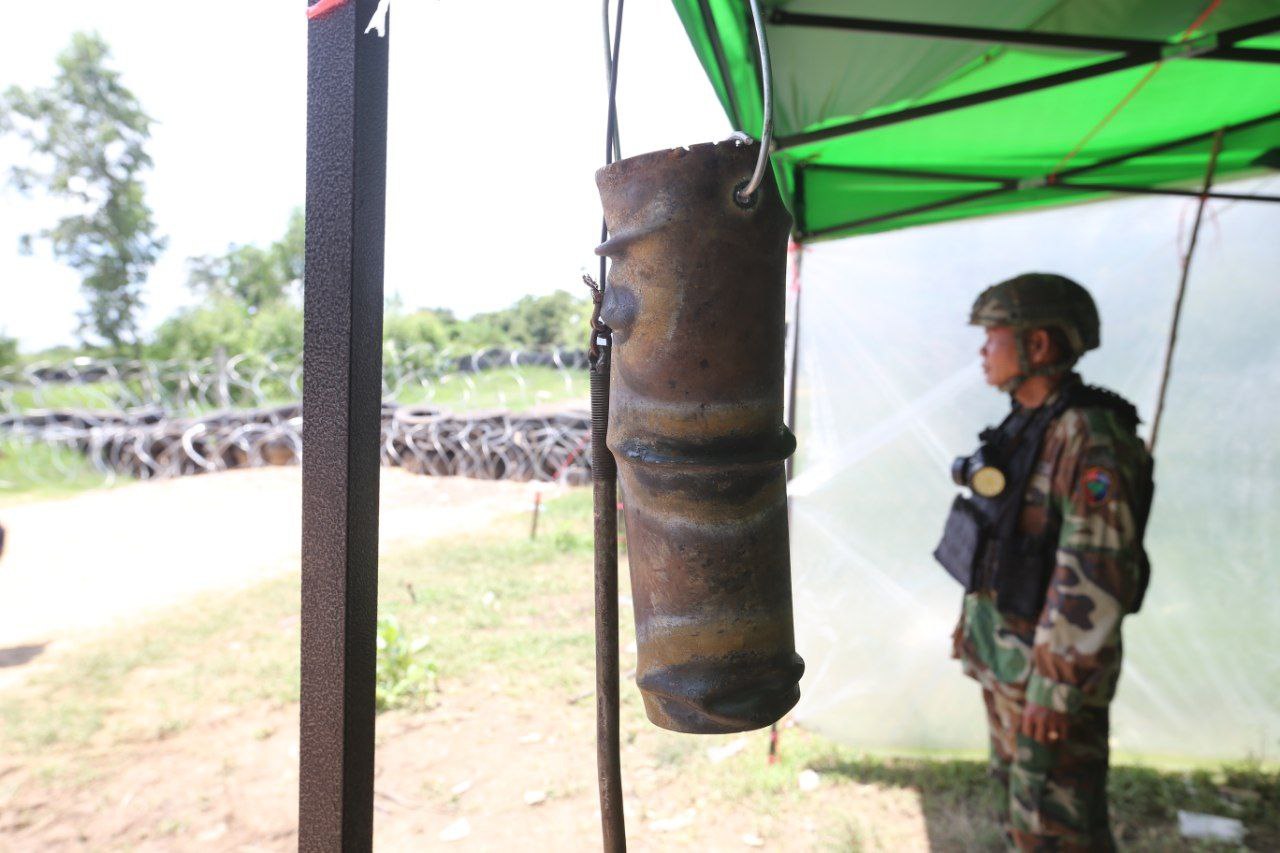 A bell has been installed to warn villagers when Thai forces try to lay new razor wire on Cambodian territory. Hong Raksmey