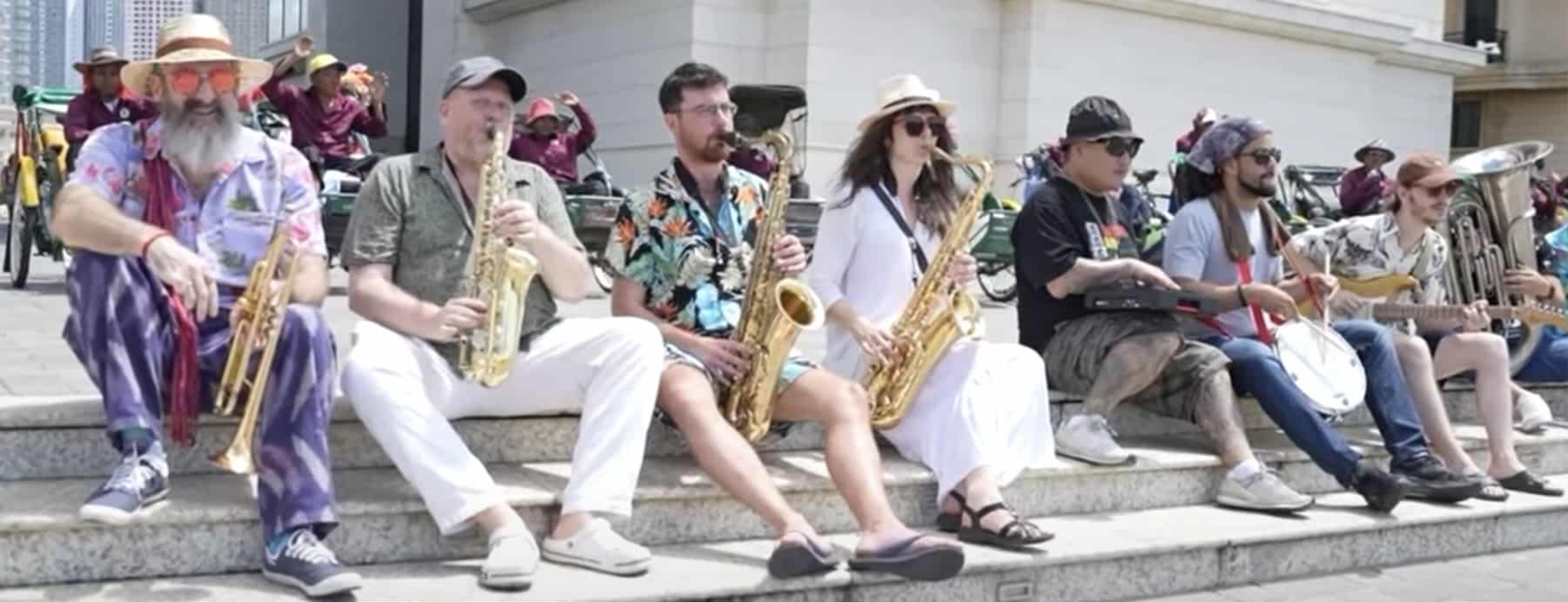 How’s this for a backline? Led by composer Cameron Smith (left), the band features a motley crew of musicians from across the globe. Supplied